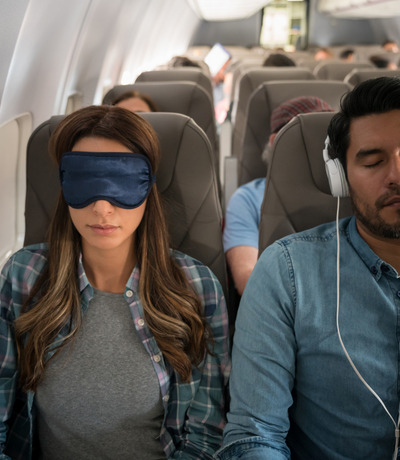 How to safely sleep on a plane