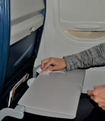 Wipe down the germiest travel surfaces, or else